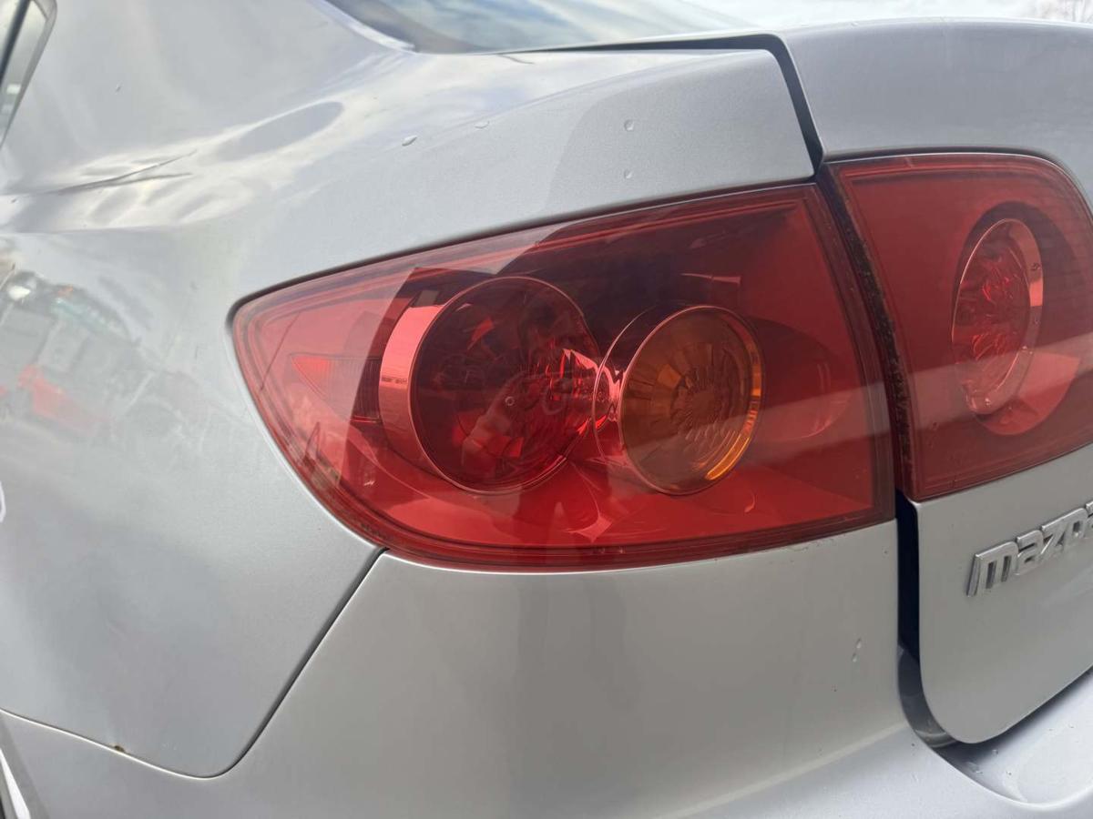 Mazda 3 BK original R&uuml;cklicht R&uuml;ckleuchte Schlussleuchte links au&szlig;en 4-T&uuml;rer Limousine Bj.2004